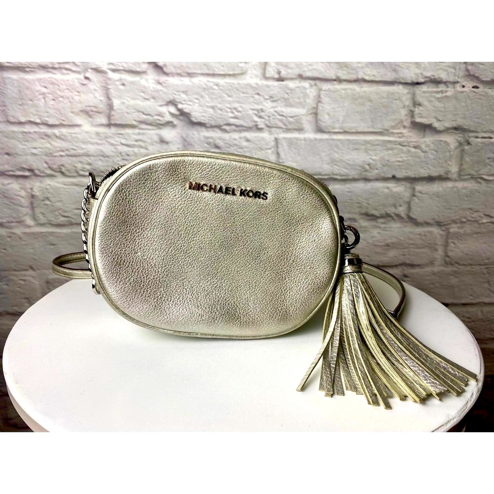 Michael Kors Silver Tassel Oval Purse